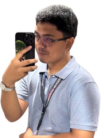 John Paul G. Manongsong wearing glasses and a light blue polo